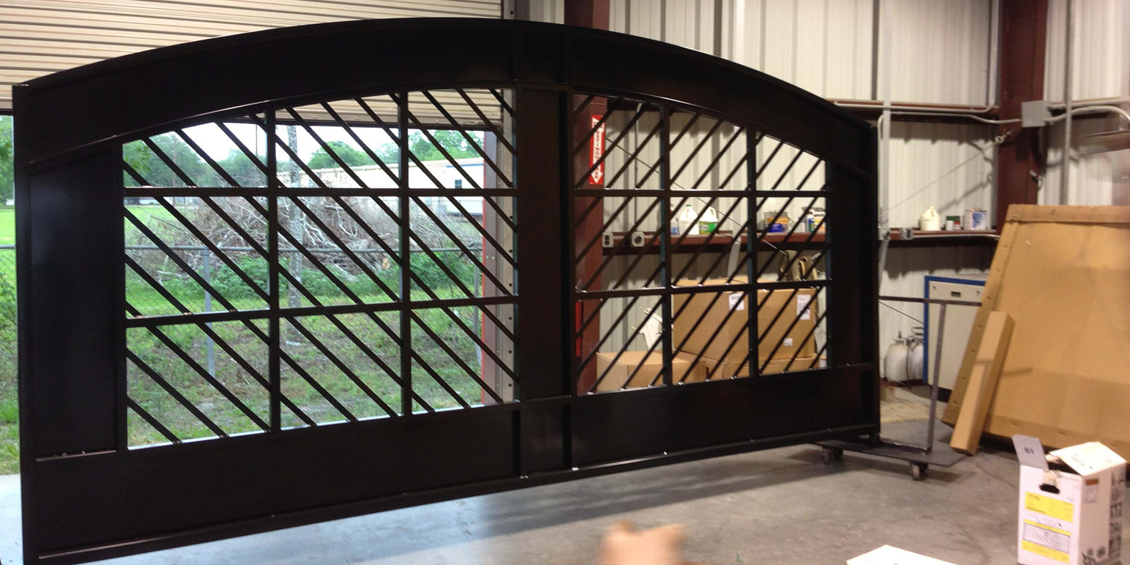 Powder coating provides the best finish possible for your custom entrance gate or fencing project.